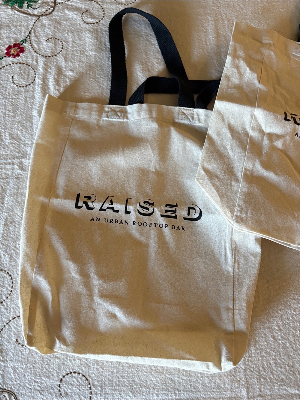 RAISED Canvas Tote Bag with Black Handles - Cream (2)